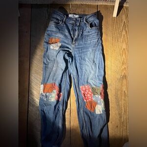 Hollister jeans with personal patchwork added
Very Unique!!